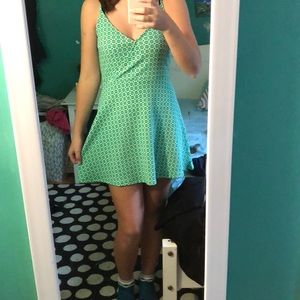 An emerald green dress.